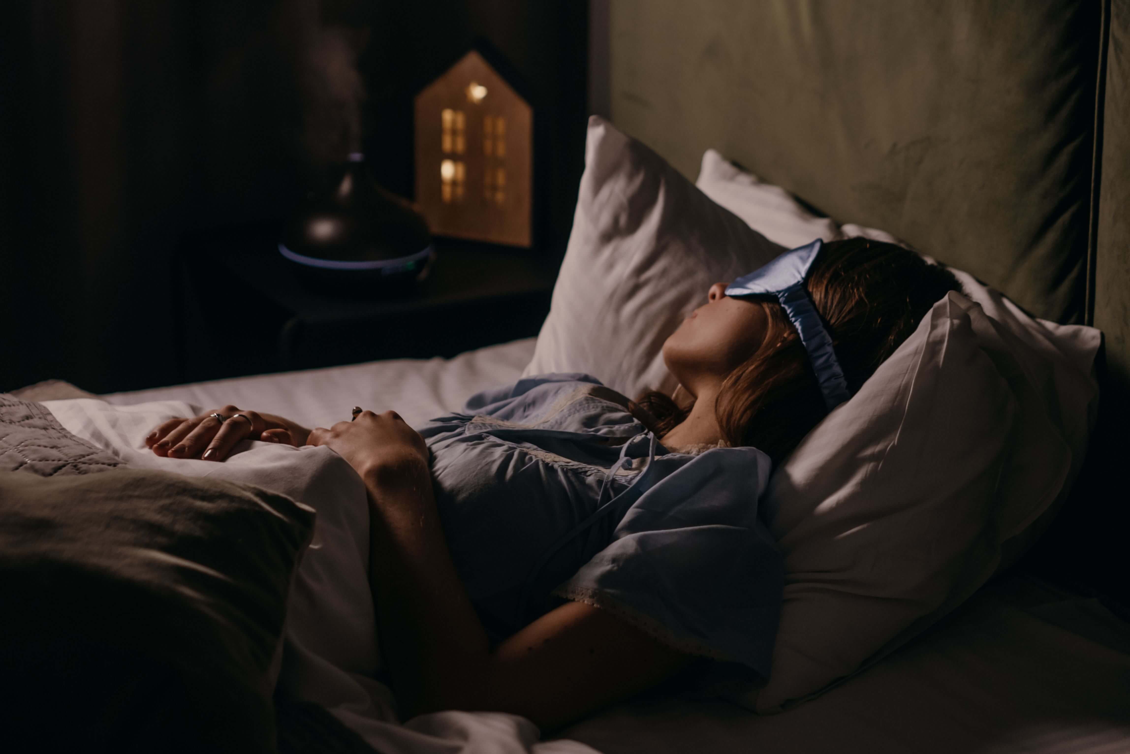 woman sleeping after taking magnesium supplements