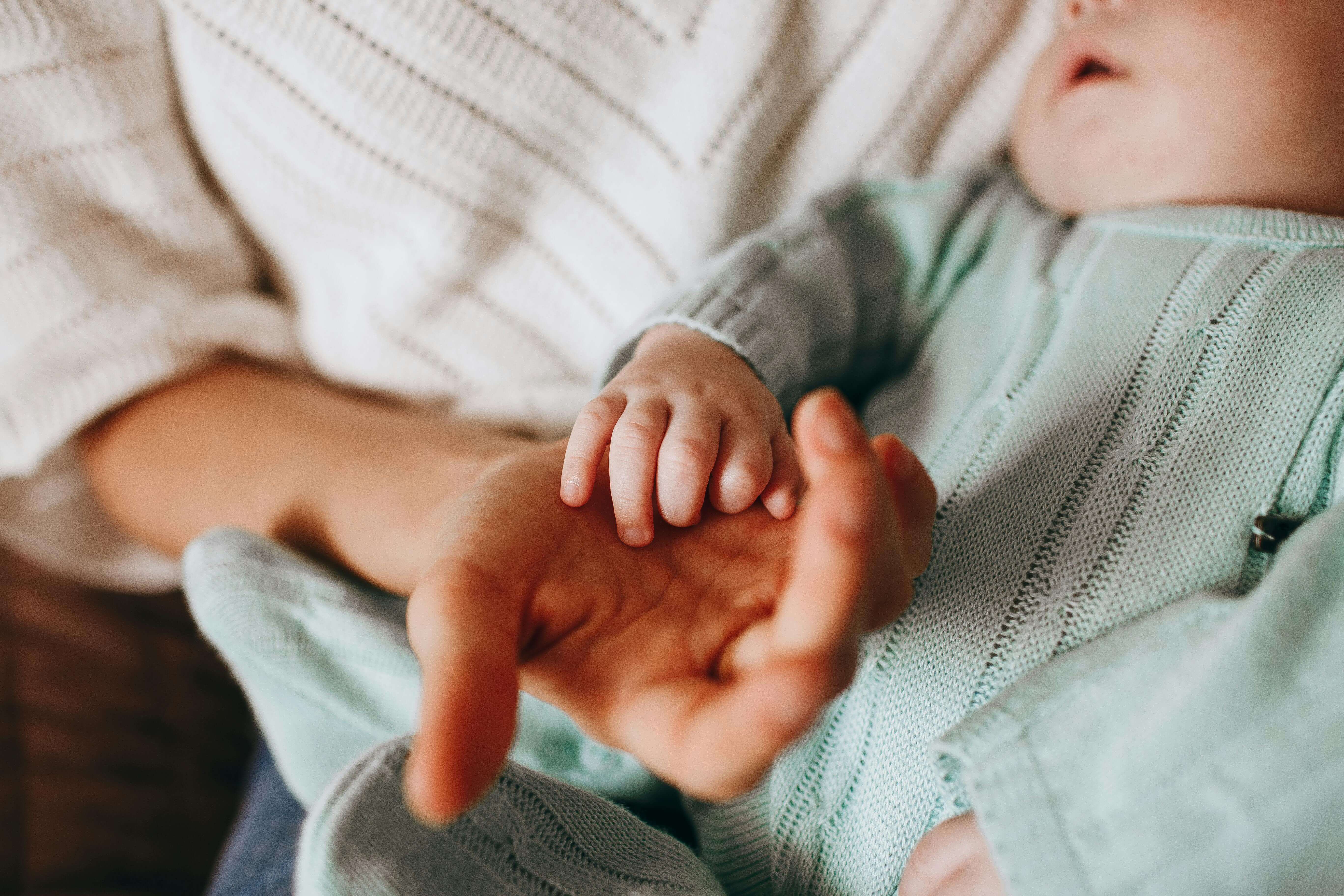 postpartum woman with baby