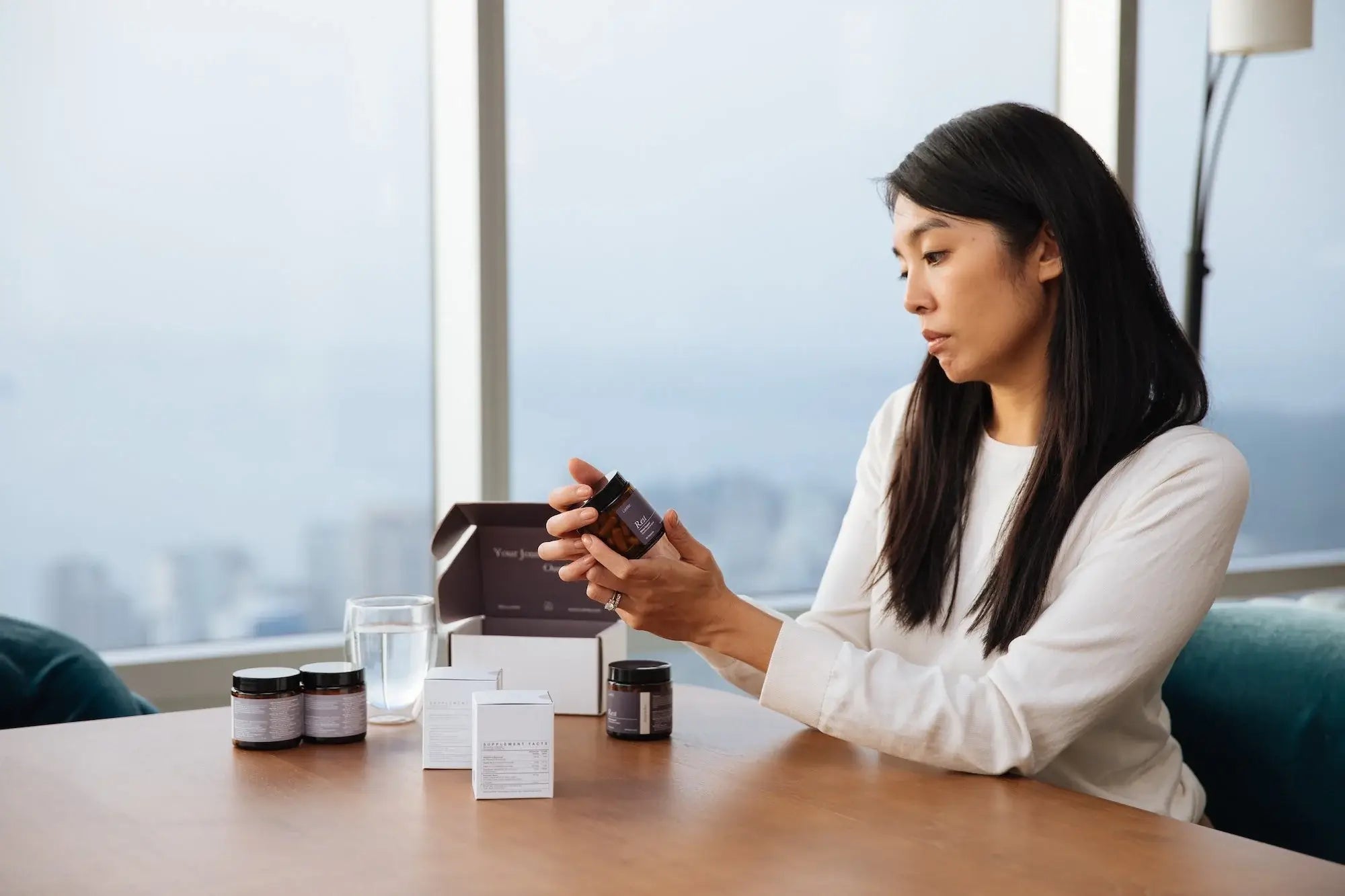 woman looking at LunHer supplements